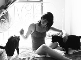 Girls with their cats by Brianne Willis