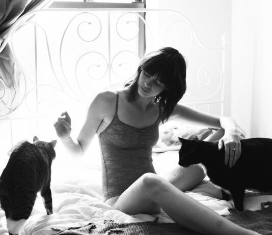 Girls with their cats by Brianne Willis